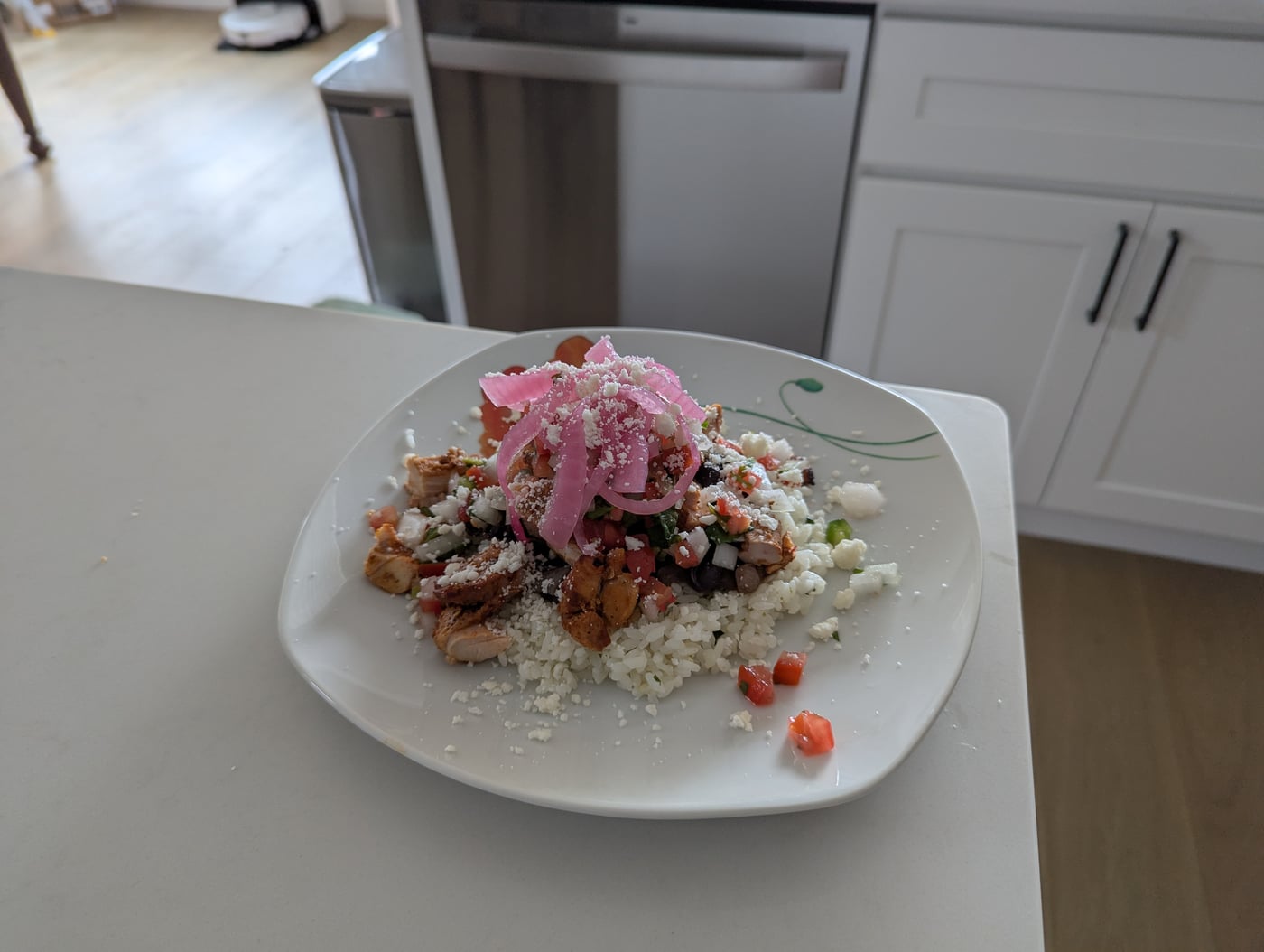 Chipotle chicken bowl topped with cotija